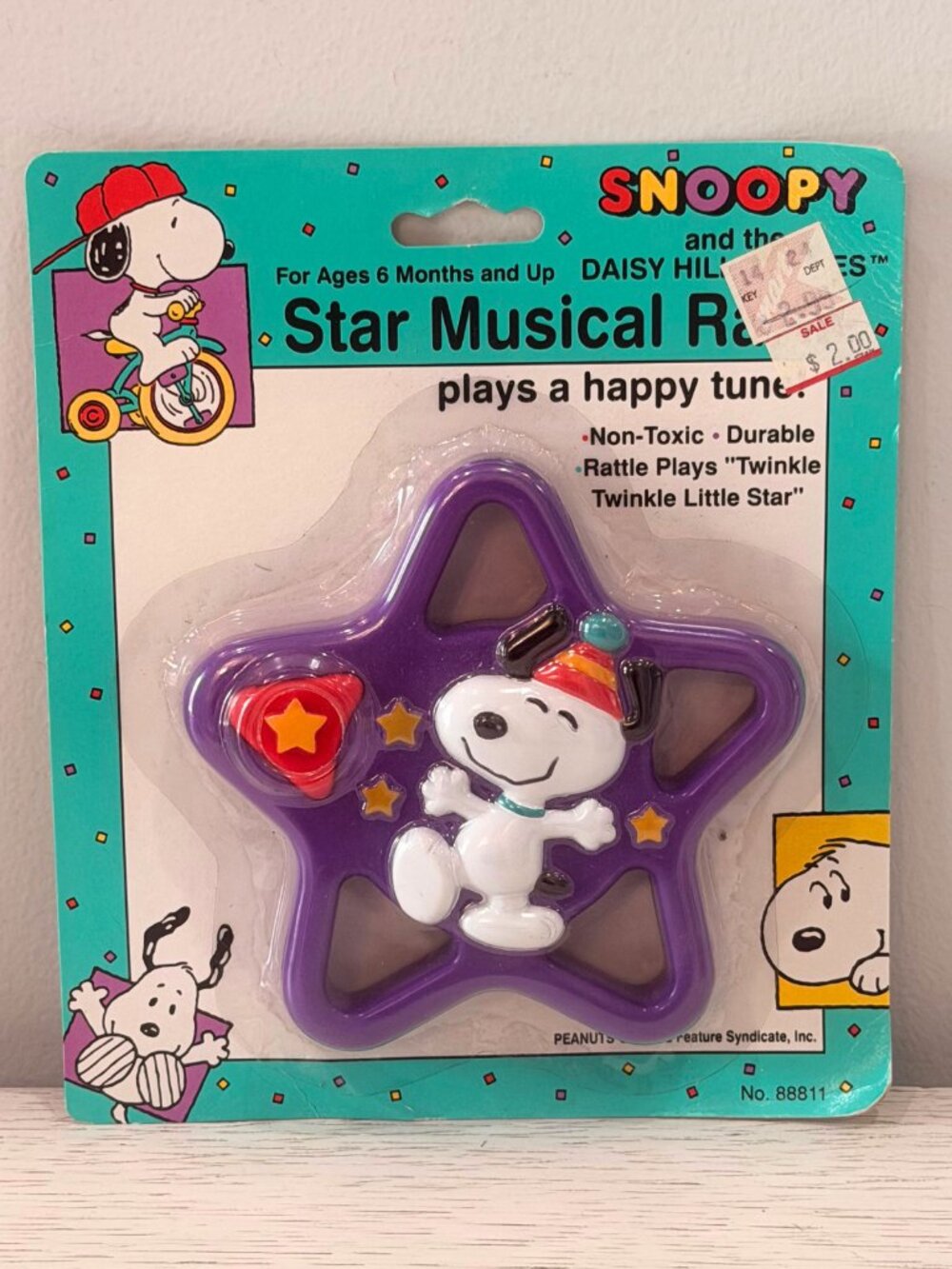 Vintage Peanuts Snoopy and the Daisy Hill Puppies Star Musical Rattle PURPLE
